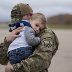 soldier-holding-boy