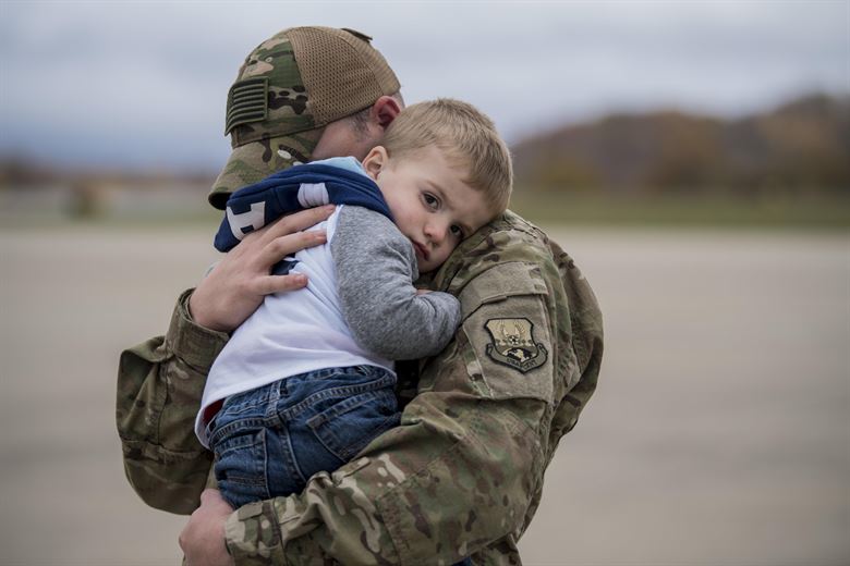 soldier-holding-boy